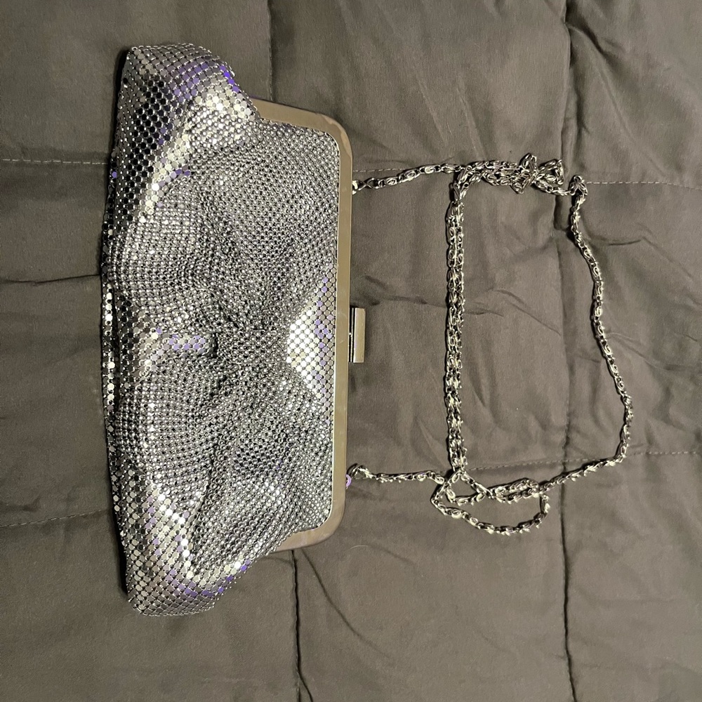 JESSICA MCCLINTOCK SILVER CLUTCH WITH BOW